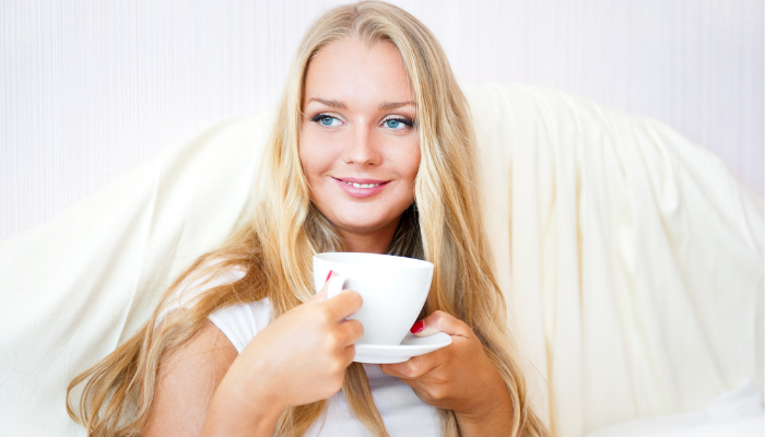 Girl holding a coffee mug